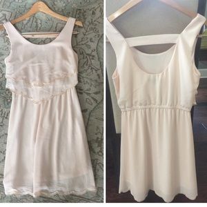 This is a light pink C. LUCE cocktail dress.